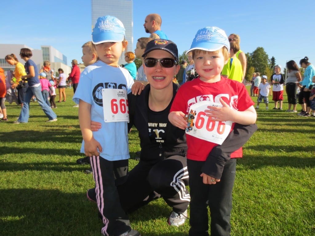 H.M. Wild with her two kids after a 2K race.