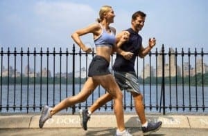 Couple Running Through Central Park Together