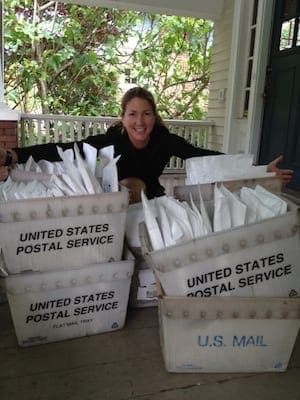 Kristin, another bigtime helper, hugging a bunch of orders when we finally got things rolling for real.