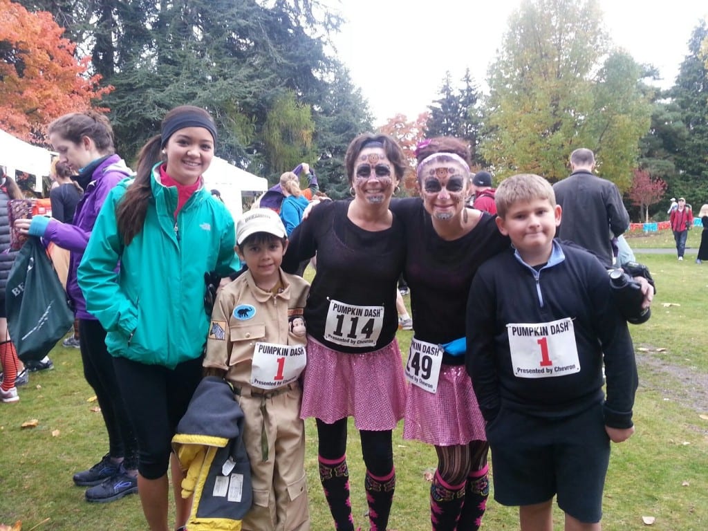 They look all pretty in pink, until you see their faces. (The Boy Scout is a nice touch too.)