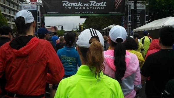 Ponytails soggy, but hats firmly in place for start of RnR Portland yesterday. 