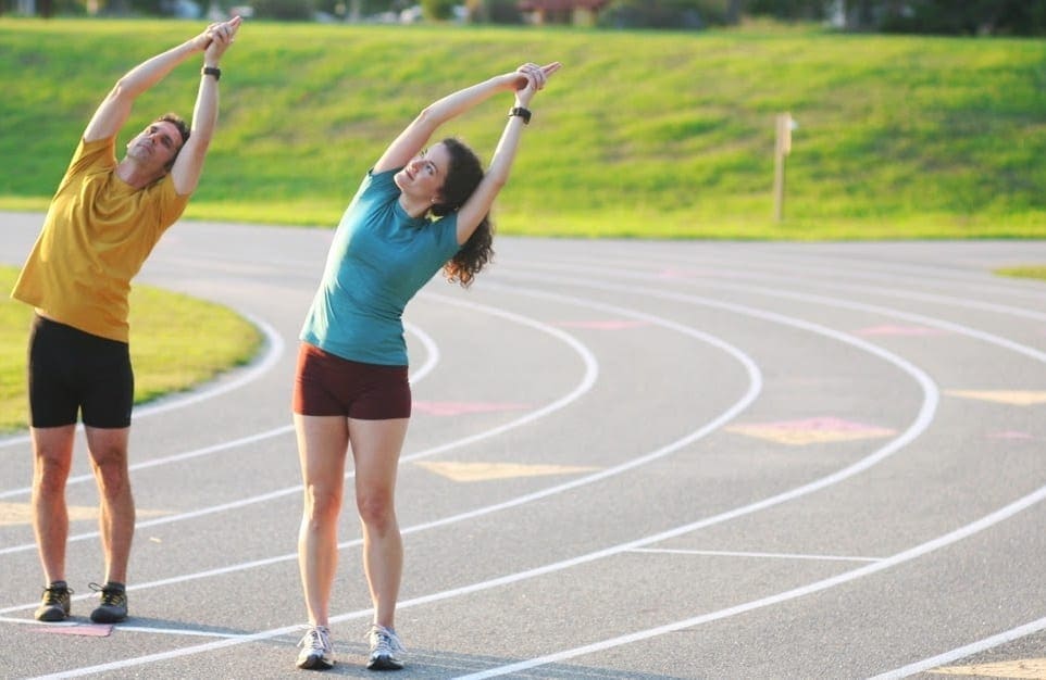 Sage Rountree going with the flow for stretching.