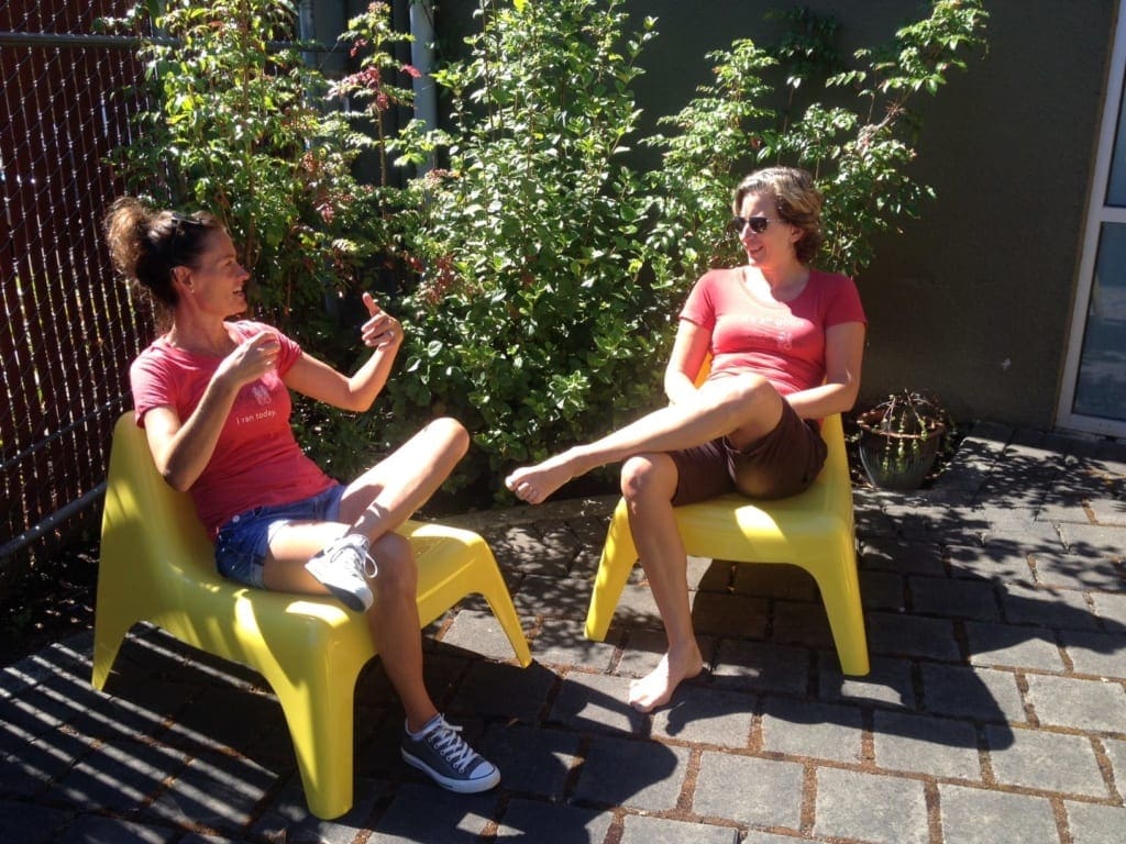 T-shirt twins Paula Harkin (left) and SBS chitchat pre-podcast