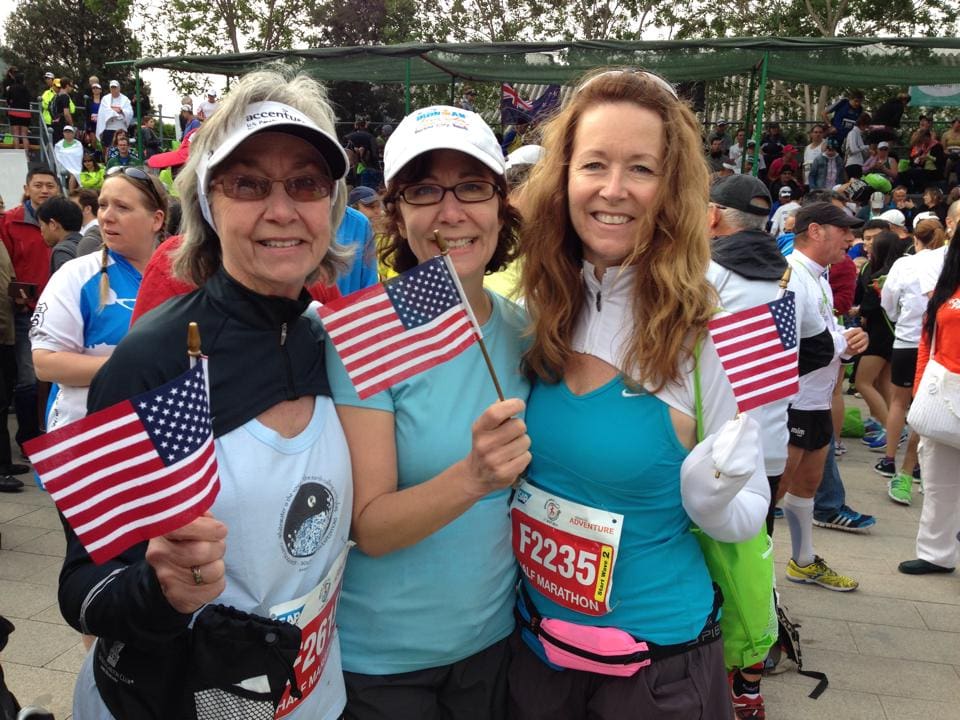Karen's mom (age 74—and her first half-marathon!), Karen's sister, and Karen at the Great Wall of China Half-Marathon.