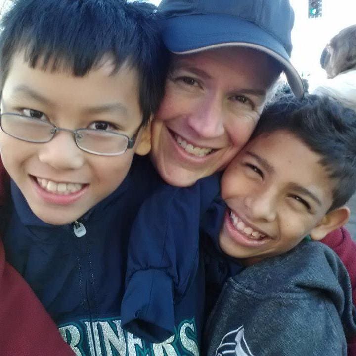 Melanie and her boys, who are all smiles after a 5K. 