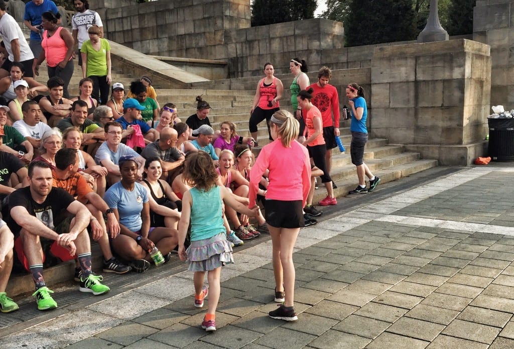 Suzanne and her 6th-grade daughter getting ready to put the November Project tribe-members through their workout.