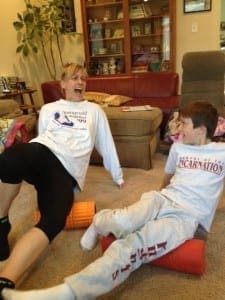 This is how she rolls: coach Christine post-run and her son