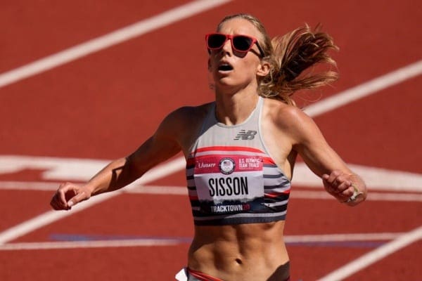 Emoly Sisson crossing the 10k finish line at the Olympic trials, choosing adversity
